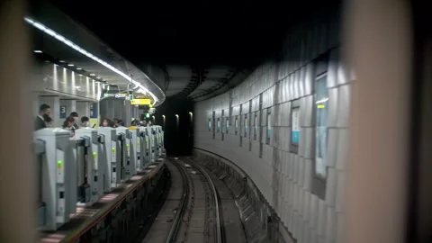 Driver view of underground metro train traveling in subway tunnel in modern urba 動画素材 244053021