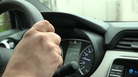 Driver at the wheel of a car Stock Footage 163860969