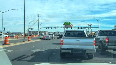 🚗 Driver&amp;#039;s View: City Intersection and Traffic Flow Stock Photos