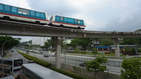 Driverless Light Rail LRT Train Driving on Elevated Tracks in Singapore Stock Footage 114490473