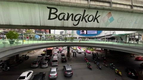 Drivers and motorcyclists navigate through central Bangkok, Thailand 4K Stock Footage 172094024