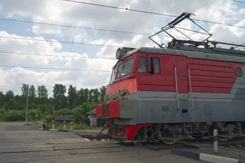 The driver's cabin of the train is at the crossing Stock Photos