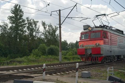 The driver's cabin of the train is at the crossing Stock Photos