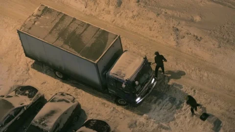 Drivers clearing snow-covered road Stock Footage 287600922