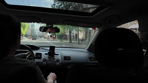 Driver's daily routine commuting through the city by car Stock-Footage 316601575