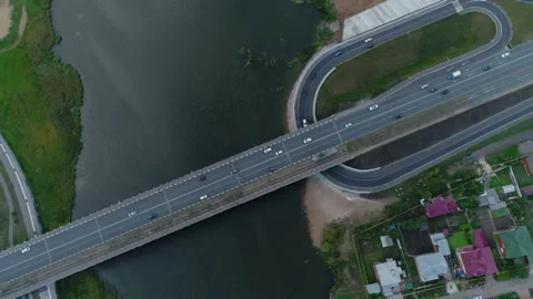 Drivers enjoy view of river driving along scenic route Stock Footage 267373581