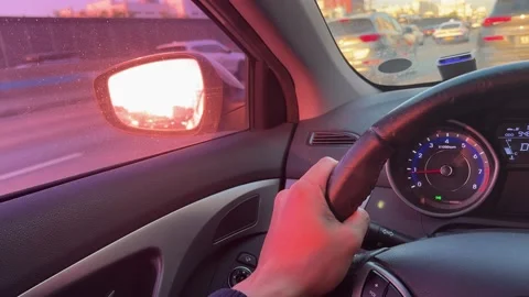 The driver's hand holding the steering wheel Stock Footage 239247207