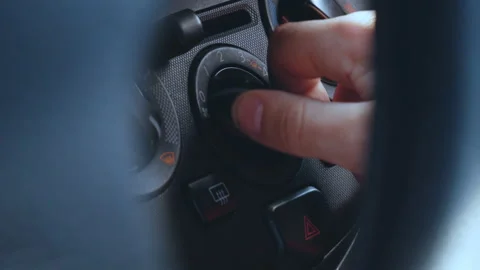 Driver's hand includes car heater and vehicle climate control settings Stock Footage 105616804