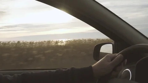 Driver's hands on the wheel Stock Footage 82970046
