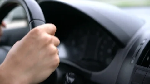 Driver's hands while driving on a freeway close up. Stock-Footage 113763763
