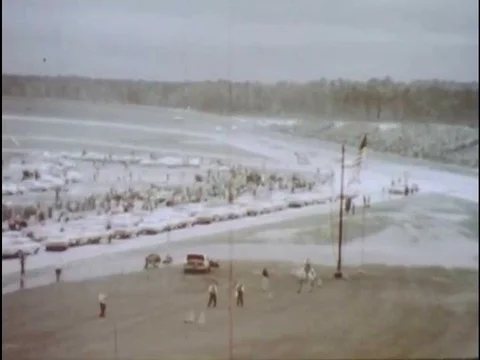 Drivers Junior Johnson and Joel Smith suffer stock car breakdowns while racing Stock Footage 75410247