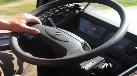 Drivers that keep hands on the wheel while driving a truck loaded with cargo Video stock 64130365