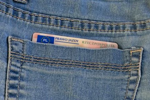 Driver's license document in the back pocket of jeans Stock Photos