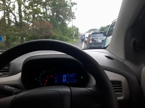 Driver's perspective from inside the car dashboard during traffic jam Stock Photos