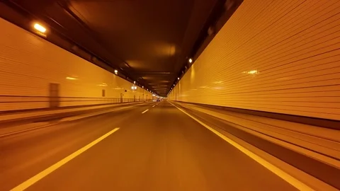 Driver's perspective - Tunnel road in central Tokyo at night Driving video Stock Footage 297120473