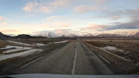 Driver's point of view driving on a snowy road in winter in Iceland Stock Footage 280894585