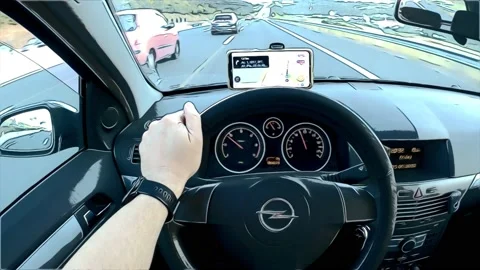 Driver's point of view, hands on the steering wheel , Animation Stock Footage 197364043