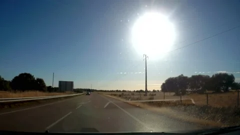 Driver's point of view, Sun Glare in Your Eyes While Driving Stock Footage 205947099