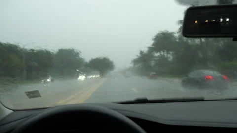 Driver's Point of View through Windshield in Rain Stock Footage 284176425