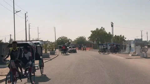 Driver's point of view while driving along the street in Morondava, Madagascar. Stock Footage 331659604