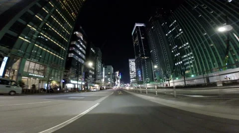 Driver's POV through the modern streets by Tokyo Station. Stock Footage 61507037