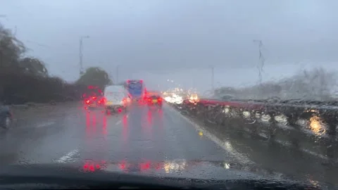 Drivers view during heavy rain storm on a motorway Stock Footage 255235758
