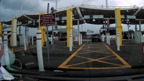 Driver's view point of UK Border Control checkpoint at Eurotunnel France Stock Footage 138458903