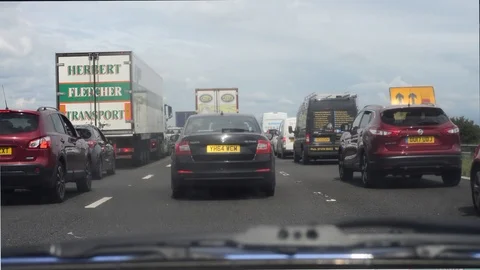 Drivers view traffic jam at roadworks on the M62 motorway Leeds uk Stock Footage 112692347