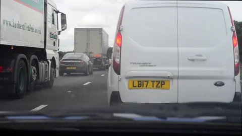 Drivers view traffic jam at roadworks on the M62 motorway Leeds uk Stock Footage 112693767