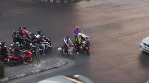 Drivers Waiting at U-Turn in Bangkok Stock Footage 148543475
