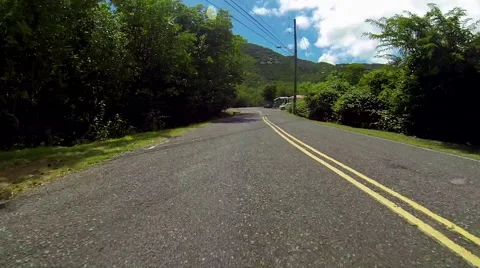 Drives by homes in the USVI Stock Footage 41537844