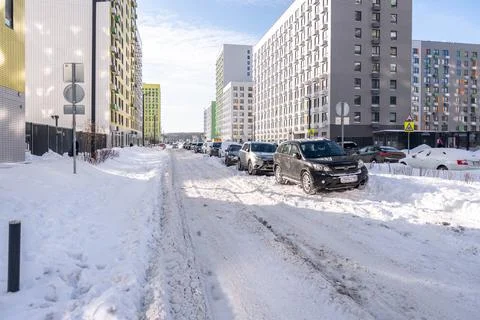 Driveways in yards after a snowfall Stock Photos
