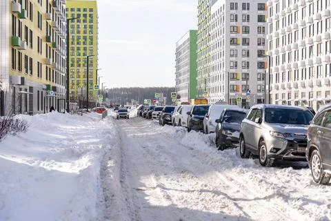 Driveways in yards after a snowfall Stock Photos
