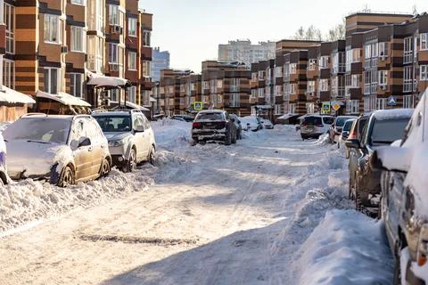 Driveways in yards after a snowfall Stock Photos
