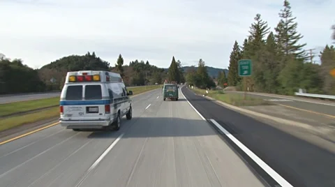 Driving 101 Northbound - Ambulance Passing VW Bus Stock Footage 10757712