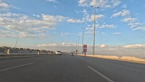 Driving across Egypt desert highways along Cairo Fayoum Desert Road travel route Stock Footage 330115076