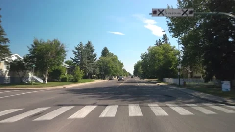 Driving across Lethbridge in Alberta during sunny summer day Video stock 146650764