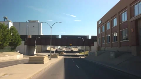 Driving across Lethbridge in Alberta during sunny summer day Video stock 146650825