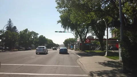 Driving across Lethbridge in Alberta during sunny summer day Video stock 146651213
