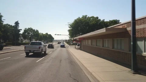 Driving across Lethbridge in Alberta during sunny summer day Video stock 146651232