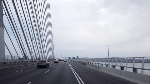 Driving across the new Champlain Bridge entering the island of Montreal Stock Footage 123784961