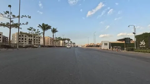 Driving Across Planned City Streets New Cairo Showing Buildings Traffic Vehicles Stock Footage 329657253