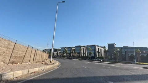 Driving Across Spacious District Streets New Cairo Showing Buildings Traffic Stock Footage 329673417