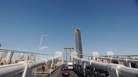 Driving Across Suspension Bridge Toward Manhattan Skyline Stock Footage 342420439