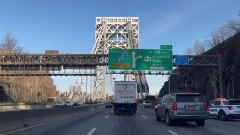 Driving across the upper level of the George Washington Bridge Stock Footage 263928298