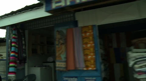 DRIVING BY ADEISO BUILDINGS AND HUTS pt1 Stock Footage 57983176