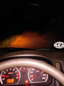 Driving alone at night Stock-Fotos