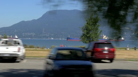 Driving along a beach. Ocean view, anchored ships. Sunny day. 스톡 동영상 93596473