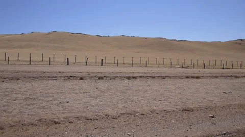 Driving along the border between the states. Barbed wire on poles Stock Footage 50230072