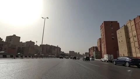 Driving Along Cairo Ring Road Highway Real Traffic and Expansive Capital City Stock Footage 329829310